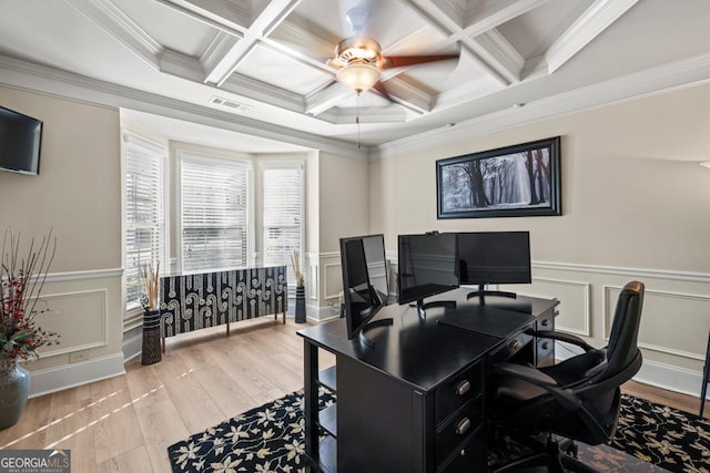 home office with beamed ceiling, ornamental molding, and coffered ceiling