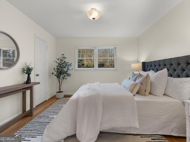 bedroom featuring hardwood / wood-style floors