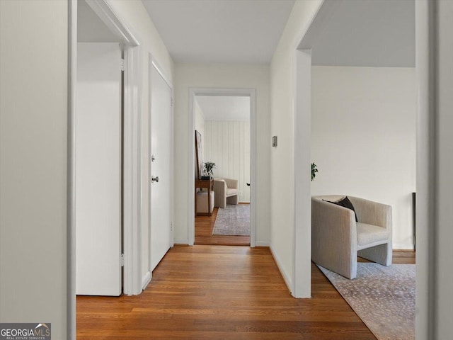 hall featuring hardwood / wood-style flooring