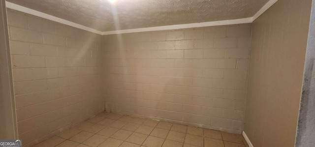 spare room featuring a textured ceiling