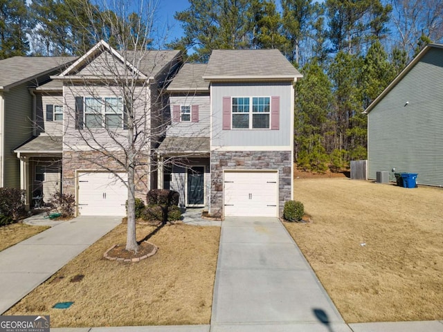 view of front facade with a front lawn and a garage