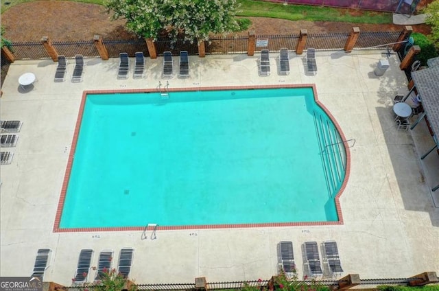 view of pool featuring a patio