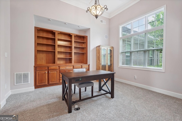 office featuring light carpet, ornamental molding, and visible vents