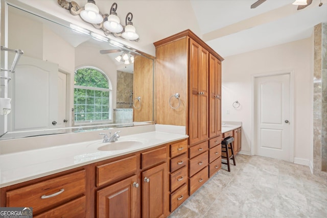 full bath featuring ceiling fan and vanity