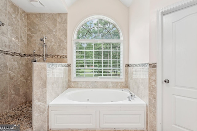 full bath with a walk in shower, a tub with jets, and visible vents