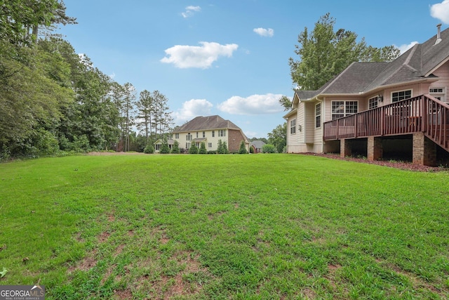 view of yard featuring a deck