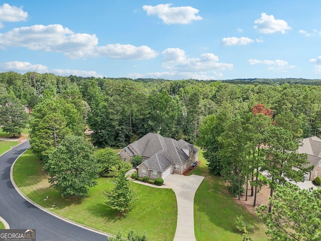 aerial view with a wooded view