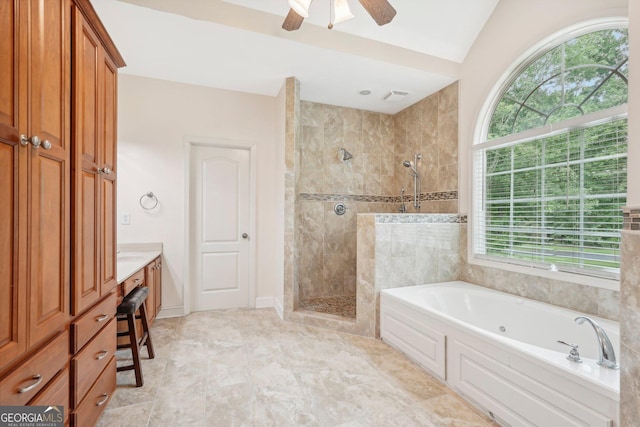 full bathroom featuring lofted ceiling, visible vents, a ceiling fan, tiled shower, and a bath