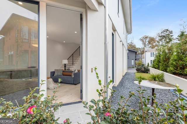 property entrance featuring a patio area