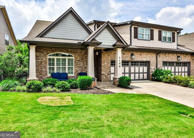 view of front facade with a garage and a front lawn