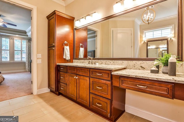 bathroom with a healthy amount of sunlight and ornamental molding