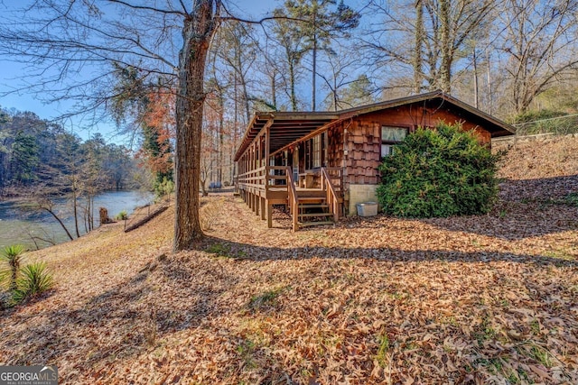 exterior space with a water view