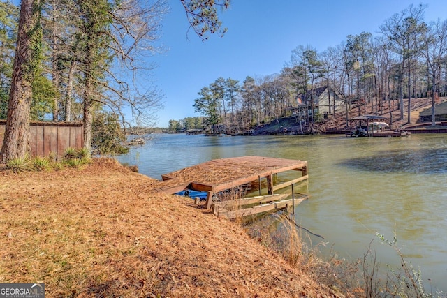 dock area featuring a water view