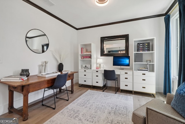 office space featuring crown molding and hardwood / wood-style floors