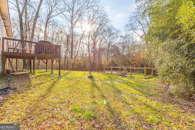 view of yard featuring a deck