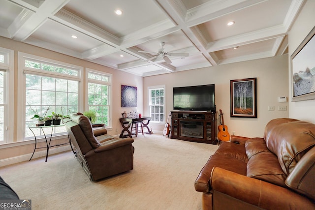 carpeted living room featuring beam ceiling, ceiling fan, coffered ceiling, and ornamental molding