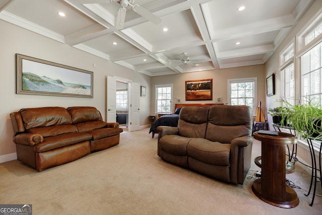 carpeted living room featuring ceiling fan, beam ceiling, ornamental molding, and coffered ceiling