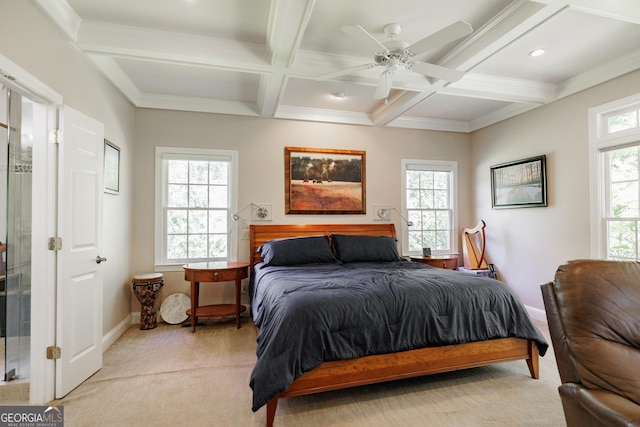 bedroom featuring coffered ceiling, light colored carpet, ceiling fan, crown molding, and beam ceiling