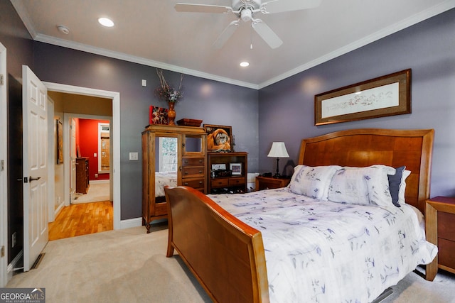 bedroom with ceiling fan, light carpet, and ornamental molding