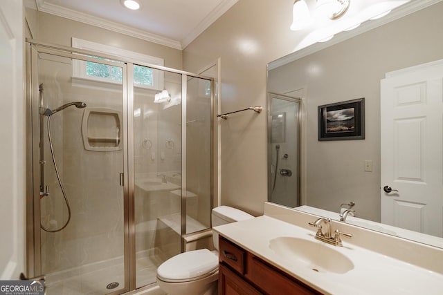 bathroom with vanity, toilet, walk in shower, and crown molding