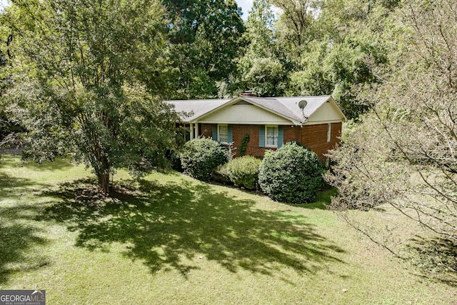 view of property exterior featuring a yard