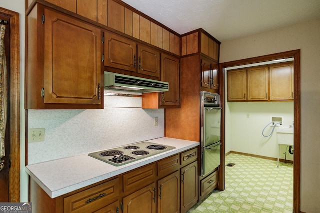 kitchen with oven and white electric stovetop