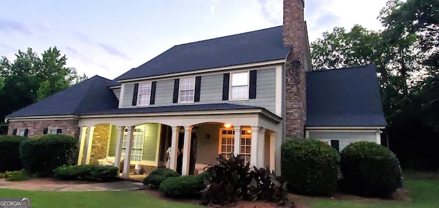 view of front of home featuring covered porch