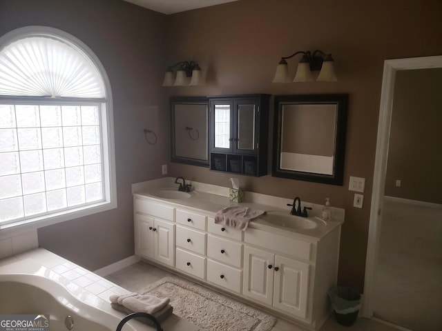 bathroom featuring tile patterned floors and vanity