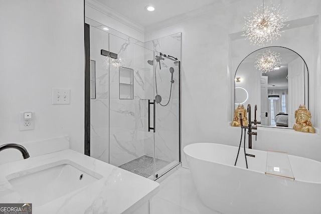 bathroom with vanity, ornamental molding, shower with separate bathtub, and an inviting chandelier