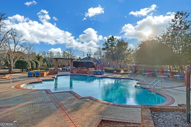 view of swimming pool featuring a patio