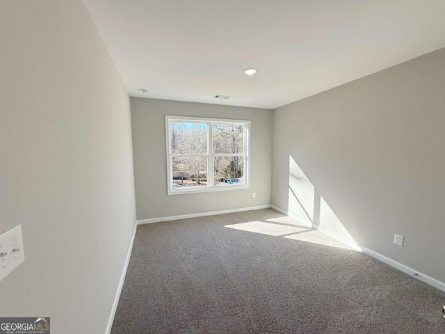 view of carpeted spare room