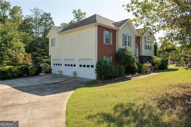 view of property exterior featuring a lawn and a garage