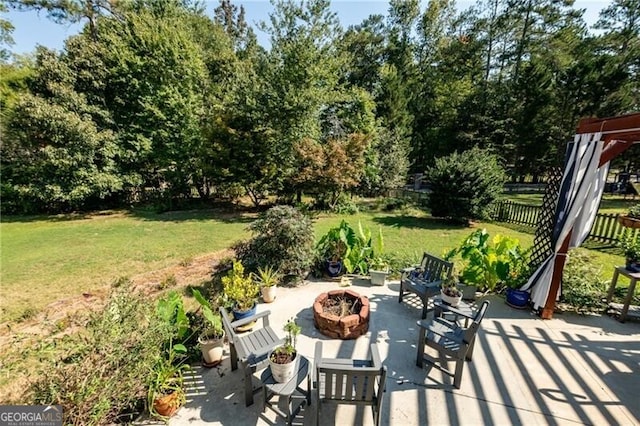 view of patio featuring a fire pit