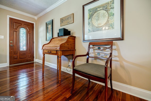 entrance foyer with dark hardwood / wood-style floors and crown molding