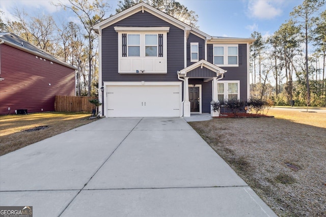 view of front of property featuring a garage