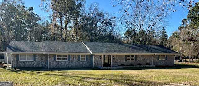 ranch-style house with a front yard