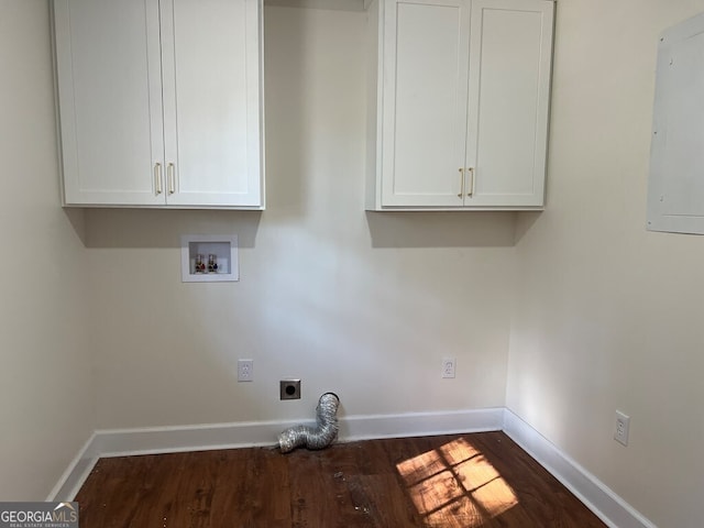 washroom with washer hookup, cabinets, hookup for an electric dryer, dark hardwood / wood-style floors, and electric panel