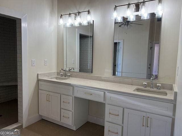 bathroom with tile patterned flooring, a shower, vanity, and ceiling fan