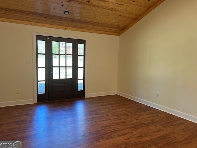 entryway featuring lofted ceiling, dark hardwood / wood-style flooring, and wooden ceiling