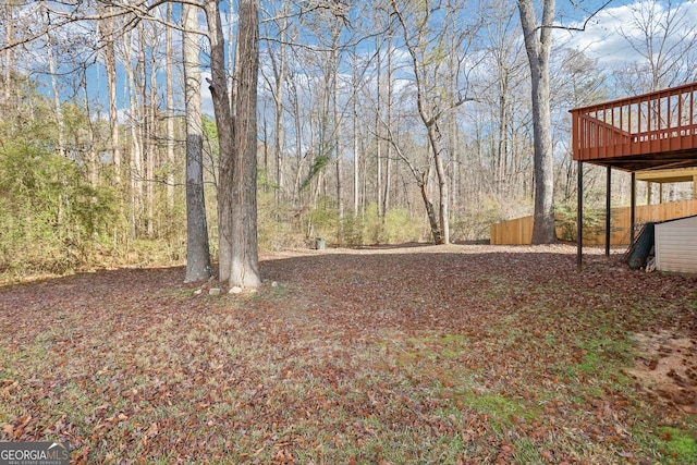 view of yard with a deck