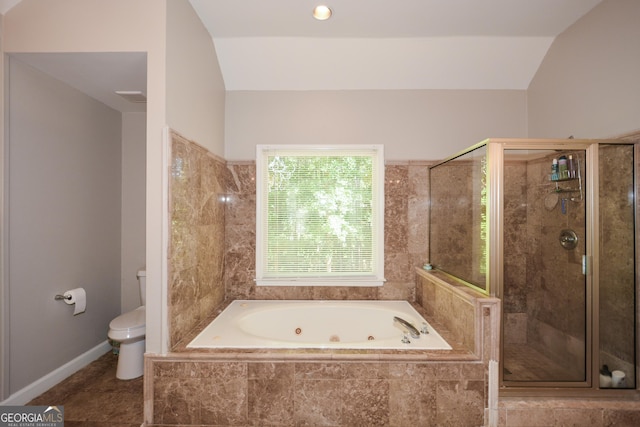 bathroom featuring shower with separate bathtub, lofted ceiling, and toilet