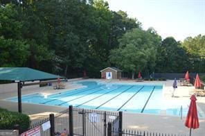 view of pool featuring a patio