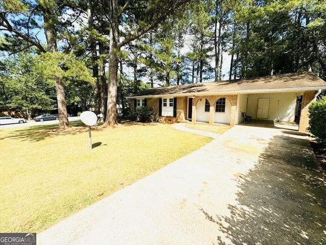 ranch-style house with a front yard and a carport