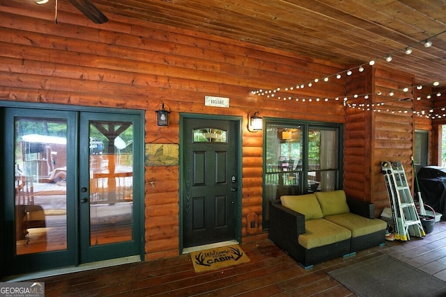 doorway to property with a porch