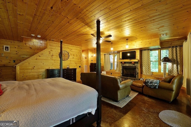 bedroom featuring a stone fireplace, wooden ceiling, and wooden walls