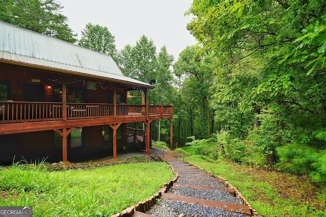 view of yard with a deck