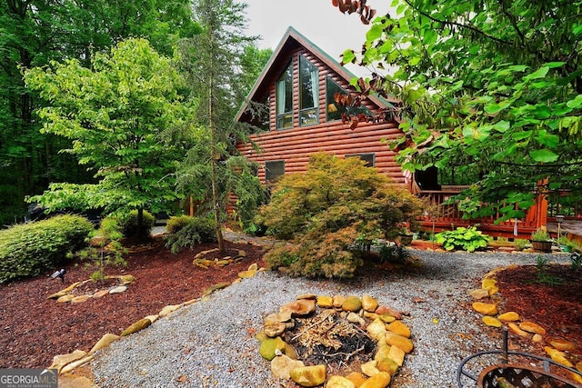 view of home's exterior featuring a deck