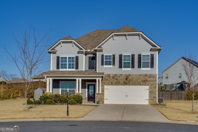 view of front of property featuring a garage