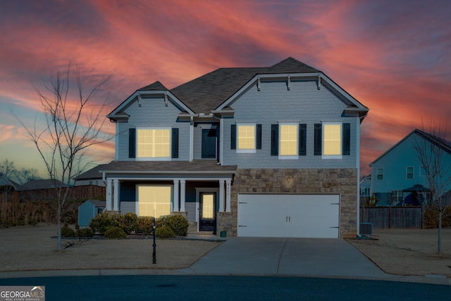 view of front of home with a garage