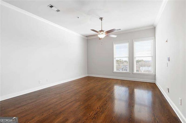 unfurnished room with ceiling fan, dark hardwood / wood-style flooring, and ornamental molding